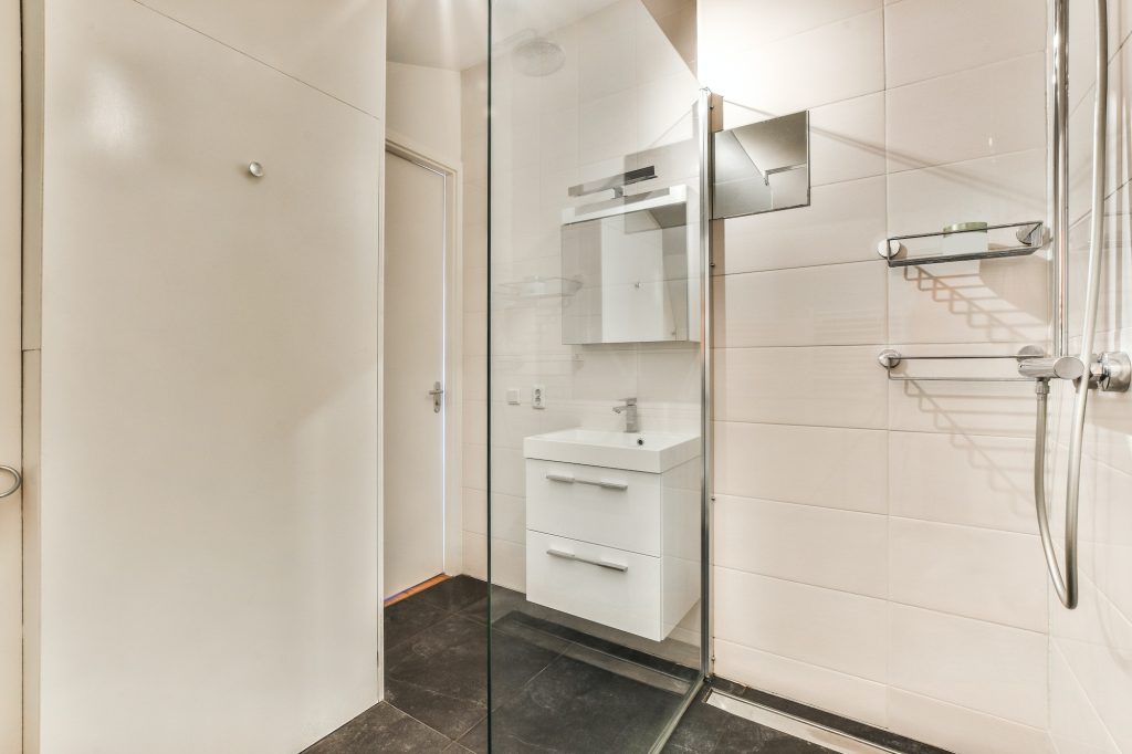 Shower cabin and sink in the bathroom